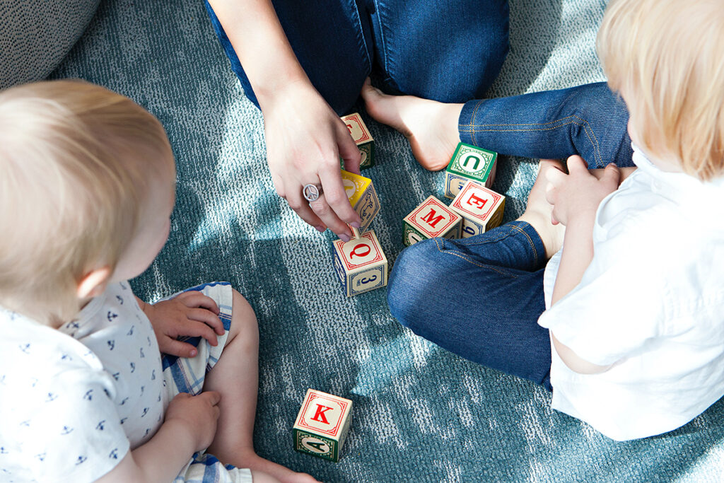 children playing with block game